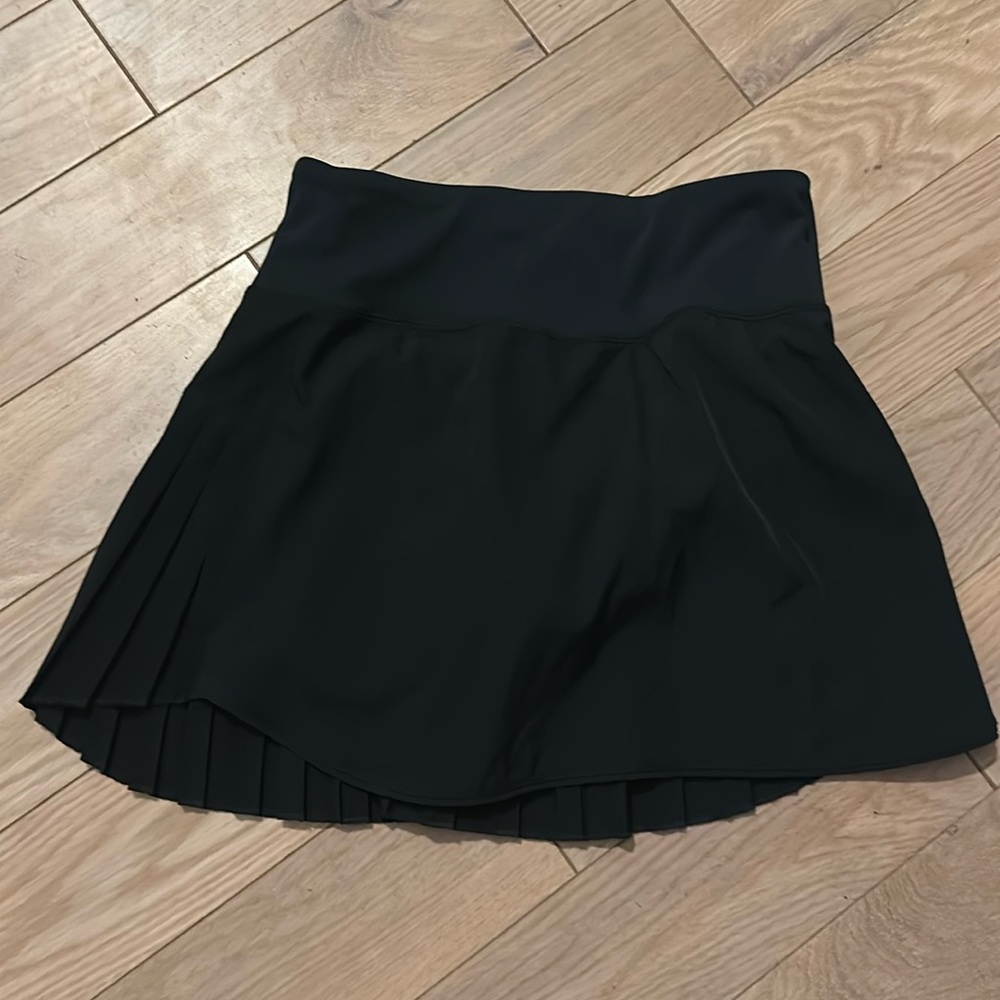 Black athletic skirt, size S, pleated back